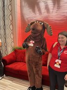 Morty the Moose, the official mascot for the Canadian Internet Registration Authority and .ca domains, poses for photos in the lobby of the conference center at WordCamp Canada 2024.