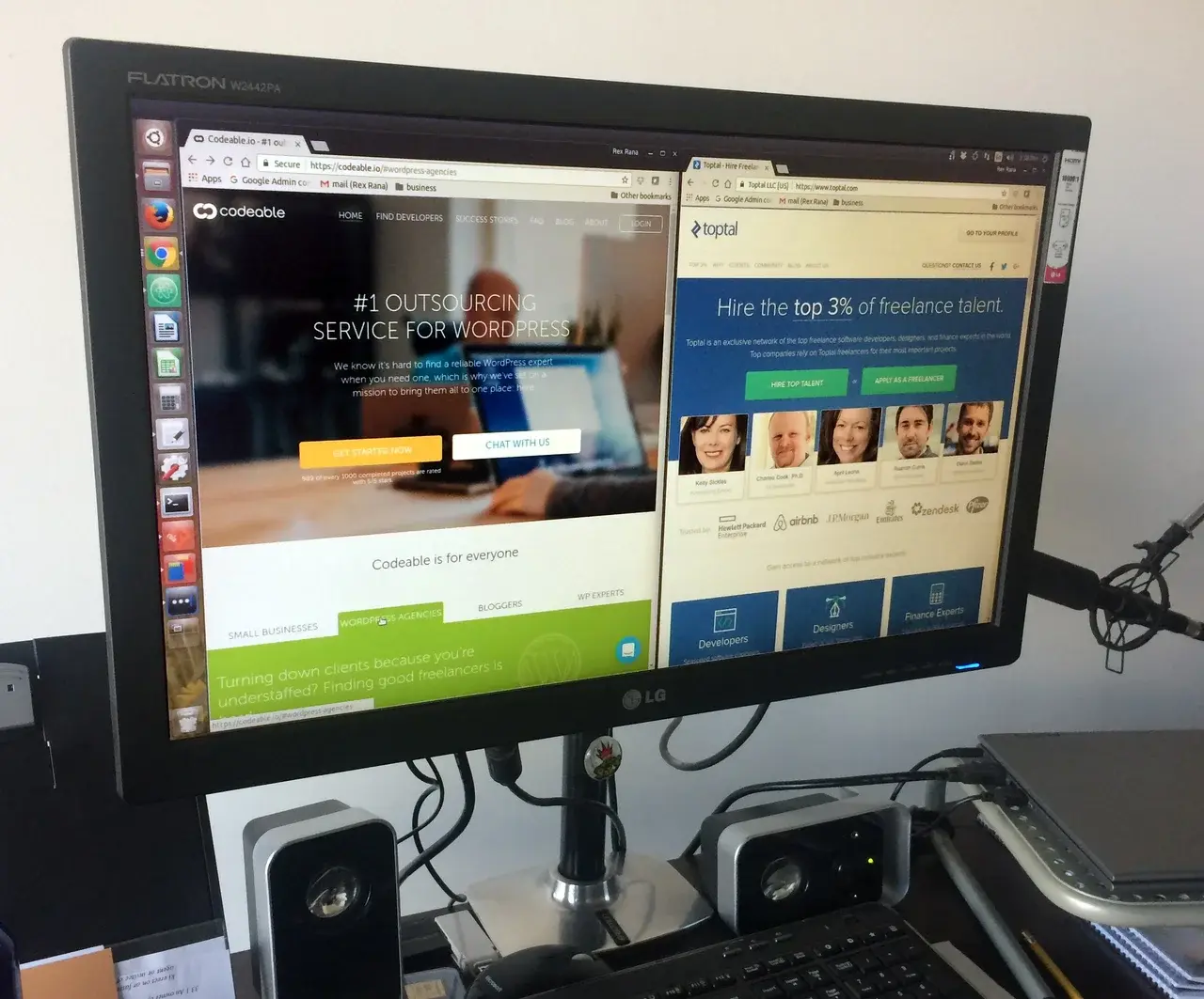 computer monitor showing websites side by side